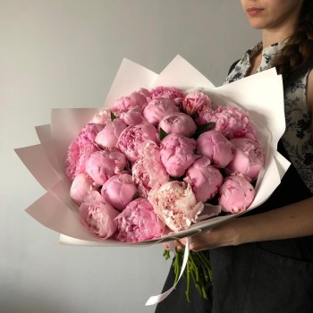 An armful of fragrant peonies